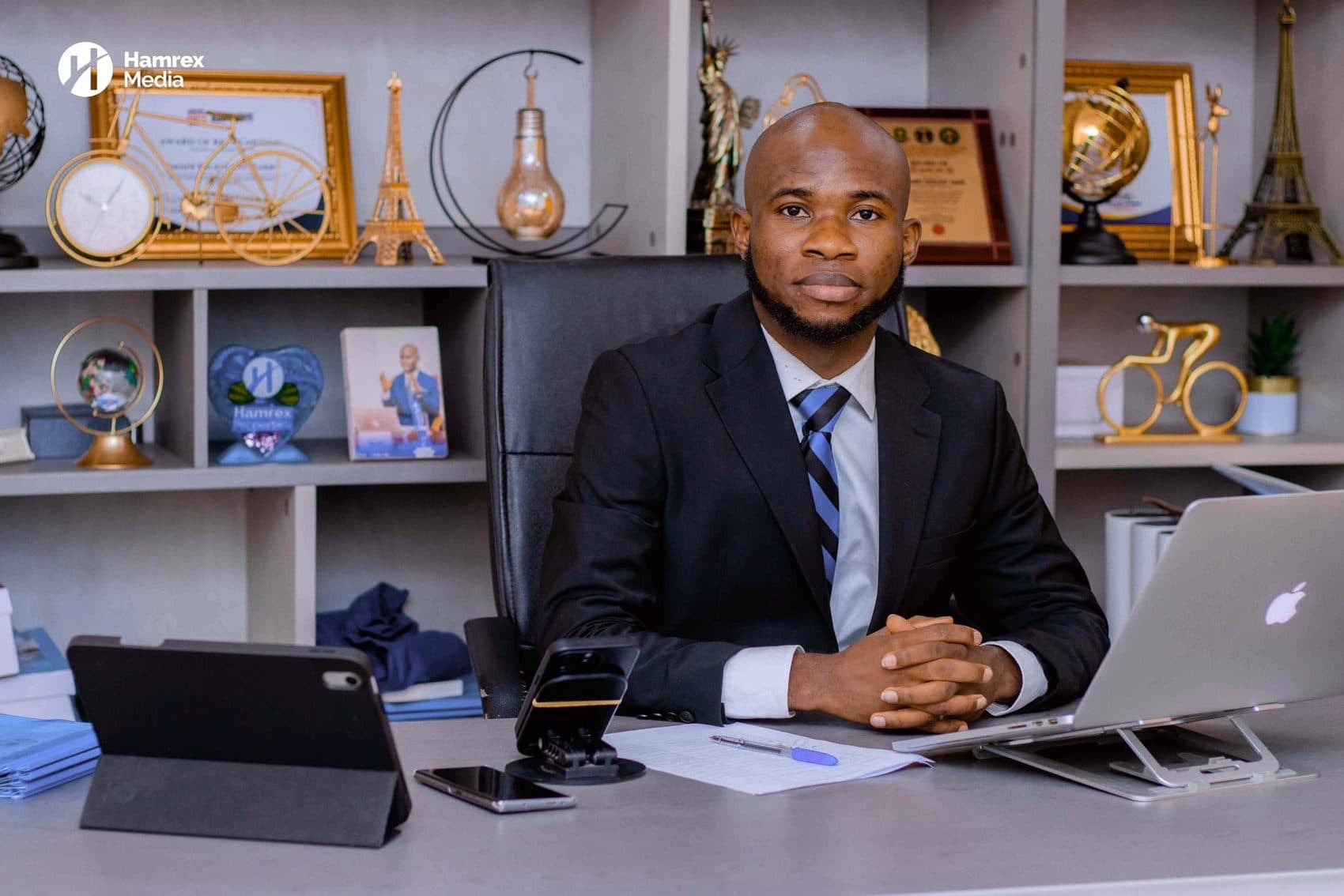 Dr. Harry Excellent Amadi at his desk